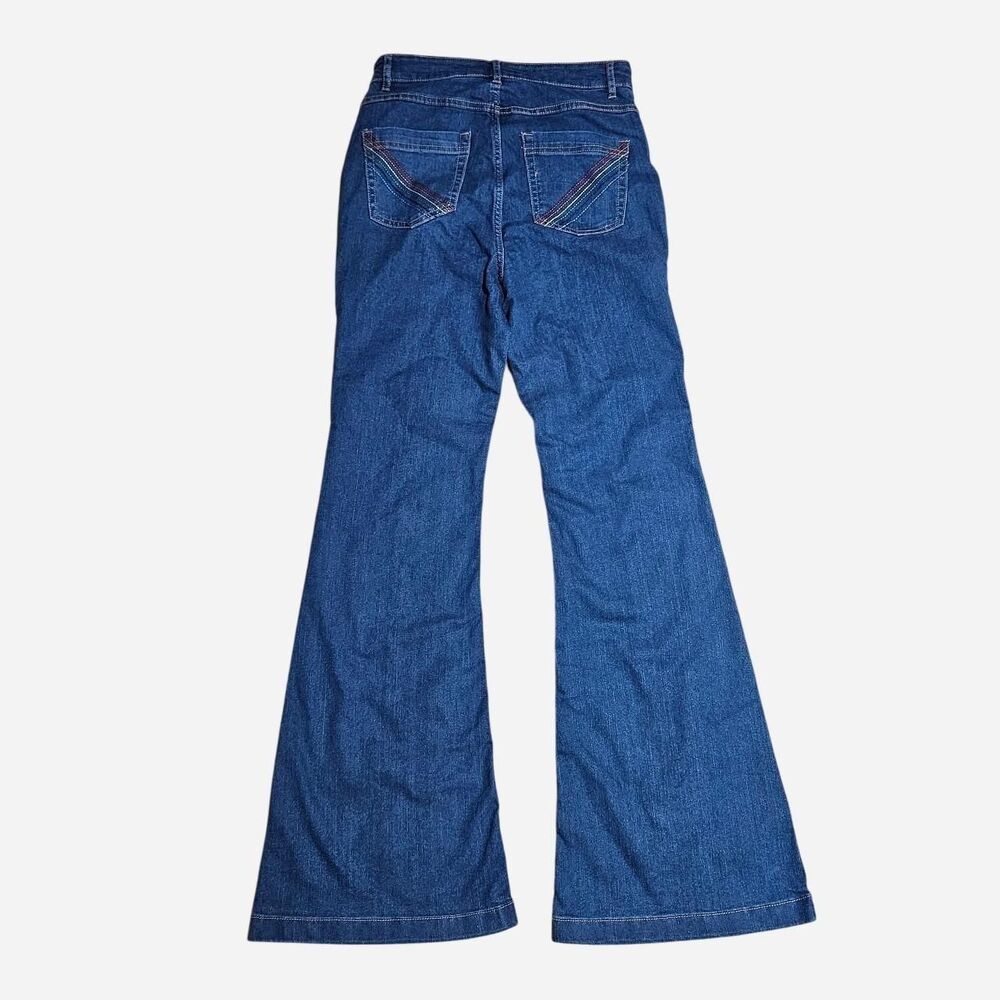 boho hippie bell bottom jeans with rainbow stitching on pockets